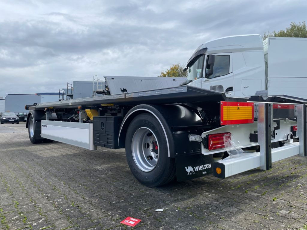 Wielton 2-Achs Außenroller-Abrollanhänger Wielton 2-Achs Außenroller-Abrollanhänger - Прицеп мультилифт/ Бункеровоз: фото 3 Wielton 2-Achs Außenroller-Abrollanhänger Wielton 2-Achs Außenroller-Abrollanhänger - Прицеп мультилифт/ Бункеровоз: фото 3