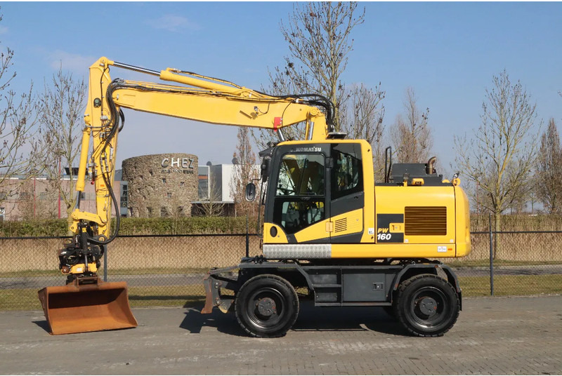 Komatsu PW160-11 | ENGCON TILTROTATOR | BUCKET | TRAILER HYDR. - Колёсный экскаватор: фото 1 Komatsu PW160-11 | ENGCON TILTROTATOR | BUCKET | TRAILER HYDR. - Колёсный экскаватор: фото 1