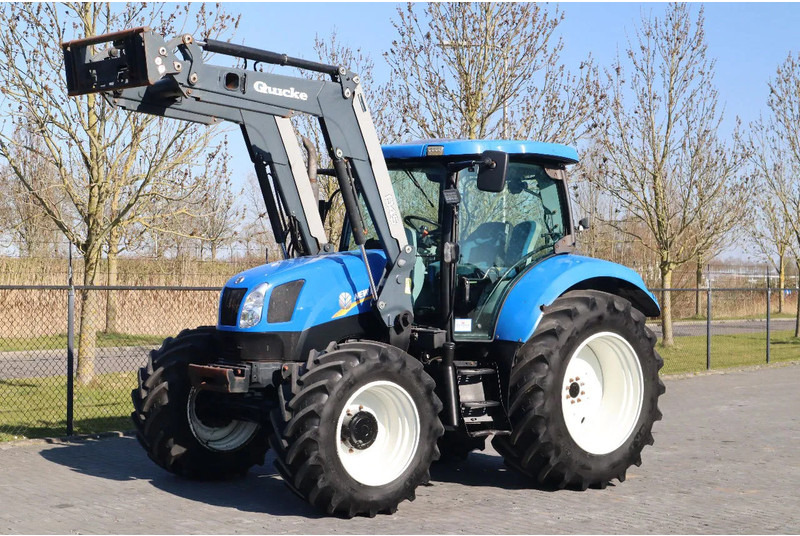 New Holland T6040 | FRONT LOADER | 50KM/H | QUICK COUPLER - Трактор: фото 1 New Holland T6040 | FRONT LOADER | 50KM/H | QUICK COUPLER - Трактор: фото 1