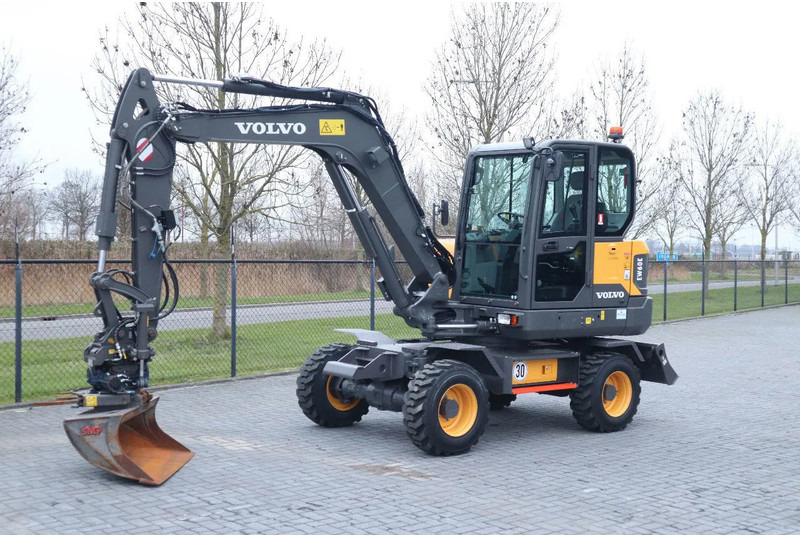 Volvo EW60E | DEMO | 30 KM/H | ROTOTILT + GRIPPER | BUCKET - Колёсный экскаватор: фото 2 Volvo EW60E | DEMO | 30 KM/H | ROTOTILT + GRIPPER | BUCKET - Колёсный экскаватор: фото 2