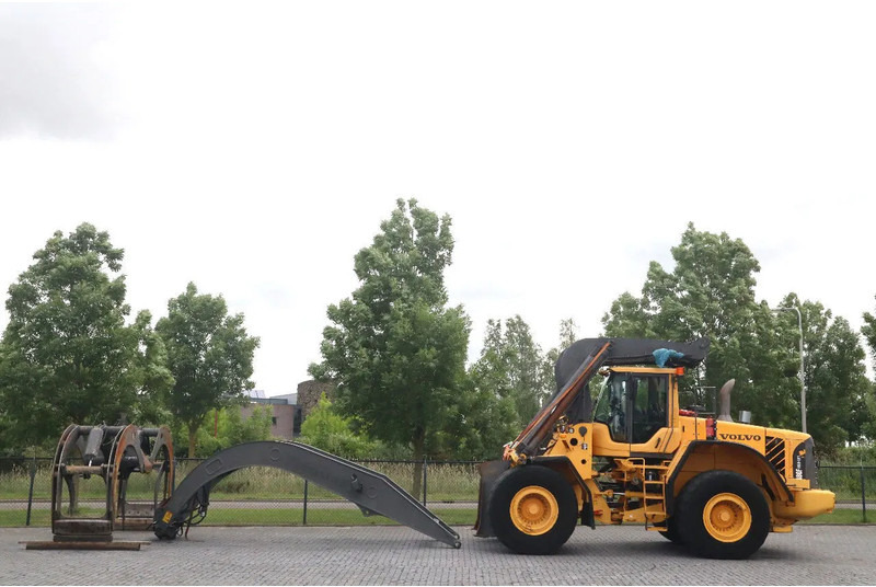 Volvo L180 F HL | HIGH-LIFT | LOG STACKER | HOLZ GRAPPLE - Колёсный погрузчик: фото 1 Volvo L180 F HL | HIGH-LIFT | LOG STACKER | HOLZ GRAPPLE - Колёсный погрузчик: фото 1