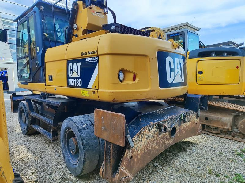 Caterpillar M318D MH - Колёсный экскаватор: фото 1 Caterpillar M318D MH - Колёсный экскаватор: фото 1