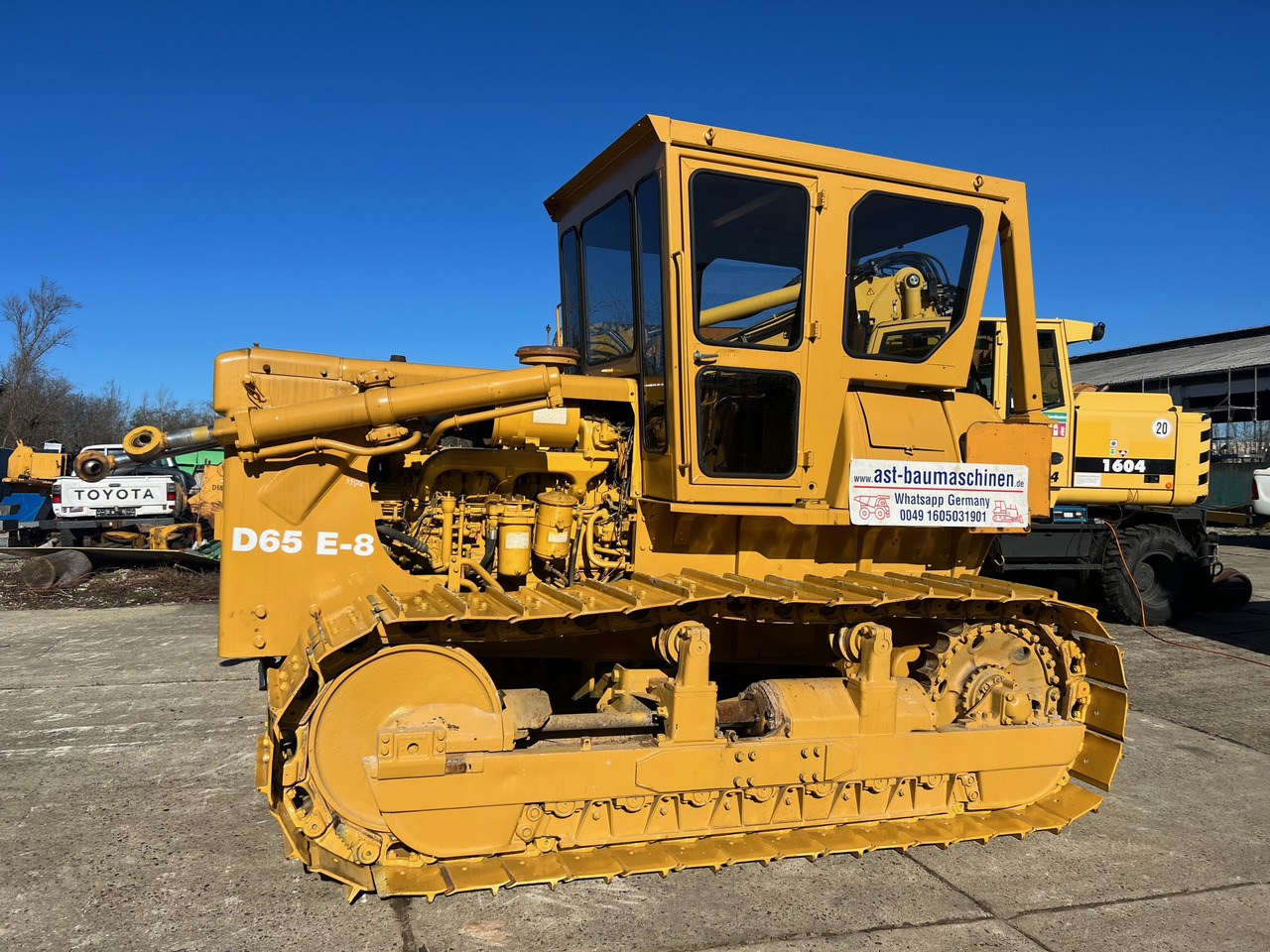 KOMATSU D65-E - Бульдозер: фото 1 KOMATSU D65-E - Бульдозер: фото 1