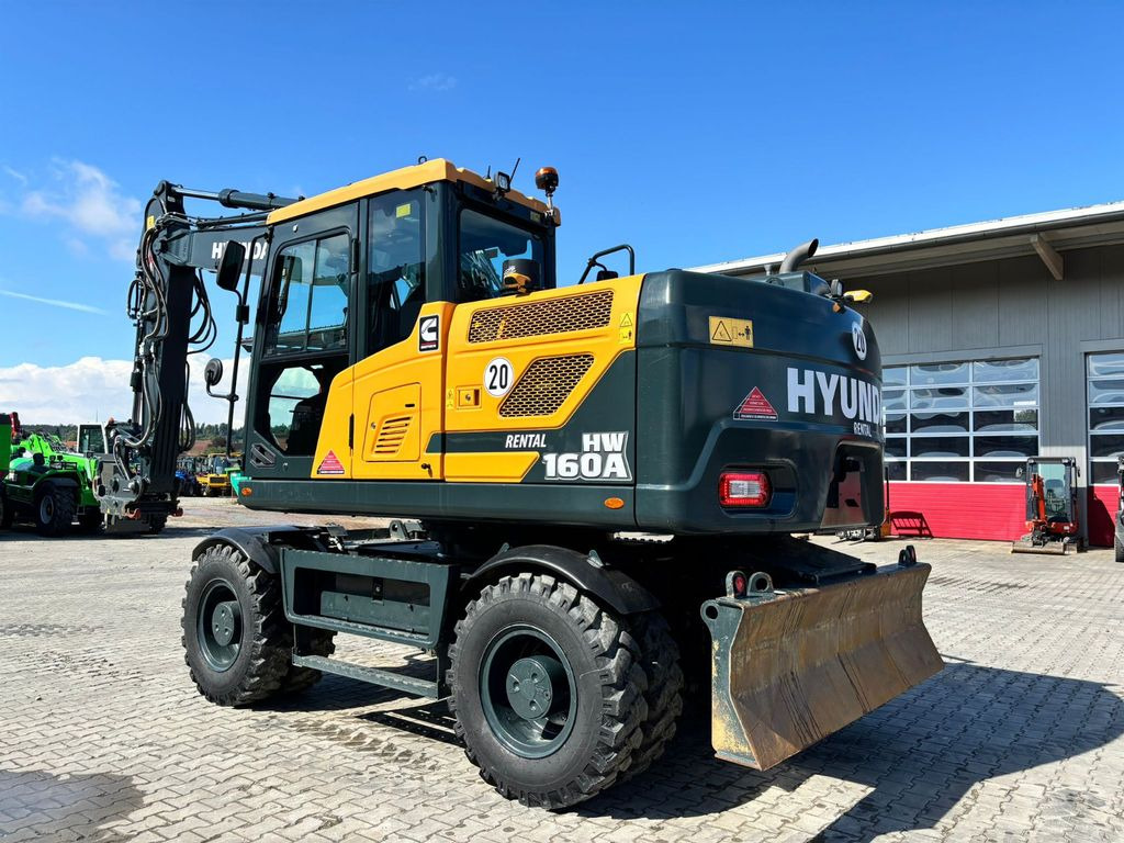 Hyundai HW160A - Колёсный экскаватор: фото 2 Hyundai HW160A - Колёсный экскаватор: фото 2