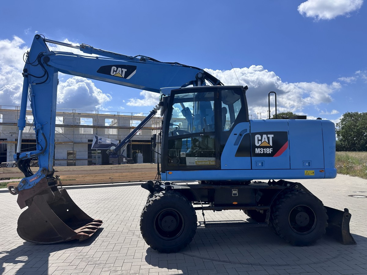 CATERPILLAR M 318 F Oil Quick OQ 65 Deutsche Maschine Top ! - Колёсный экскаватор: фото 1 CATERPILLAR M 318 F Oil Quick OQ 65 Deutsche Maschine Top ! - Колёсный экскаватор: фото 1