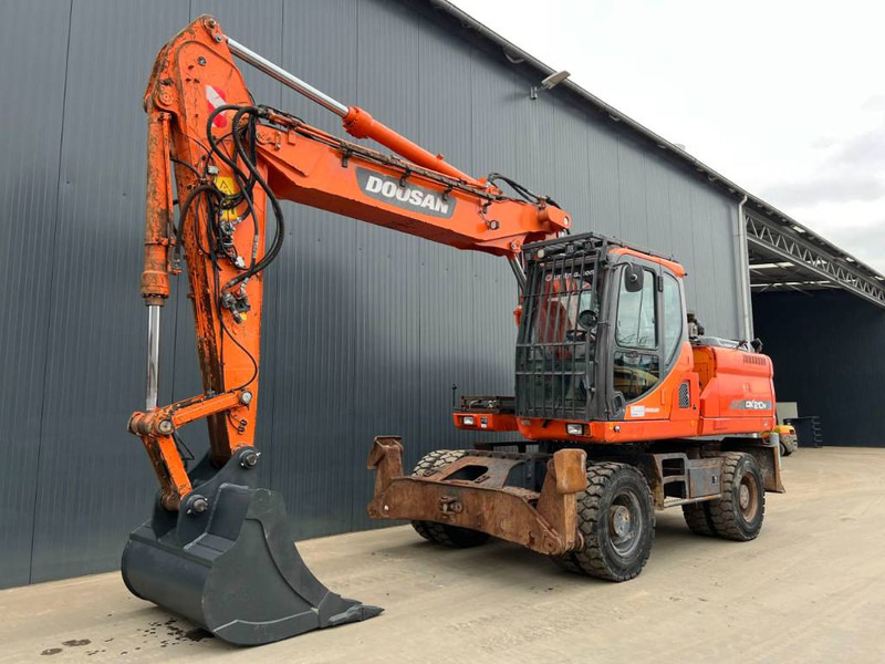 Doosan DX210W - Колёсный экскаватор: фото 1 Doosan DX210W - Колёсный экскаватор: фото 1