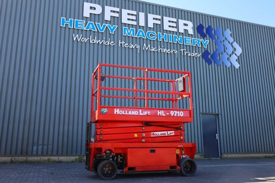 Holland Lift Ecostar HL-9710 Electric, 12m Working Height, 325k  - Ножничный подъемник: фото 1 Holland Lift Ecostar HL-9710 Electric, 12m Working Height, 325k  - Ножничный подъемник: фото 1