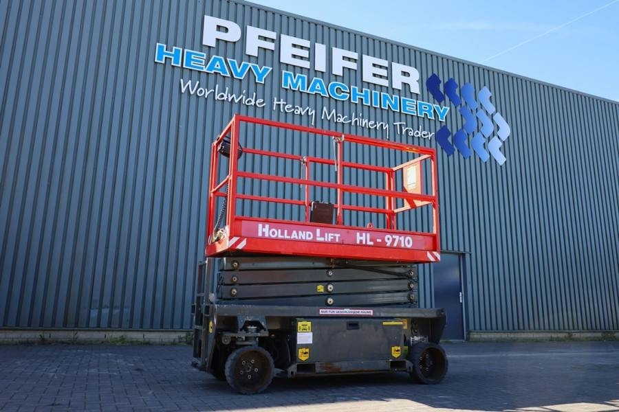 Holland Lift Ecostar HL-9710 Electric, 12m Working Height, 325k  - Ножничный подъемник: фото 1 Holland Lift Ecostar HL-9710 Electric, 12m Working Height, 325k  - Ножничный подъемник: фото 1