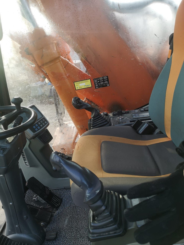 Doosan DX 140 - Колёсный экскаватор: фото 4 Doosan DX 140 - Колёсный экскаватор: фото 4