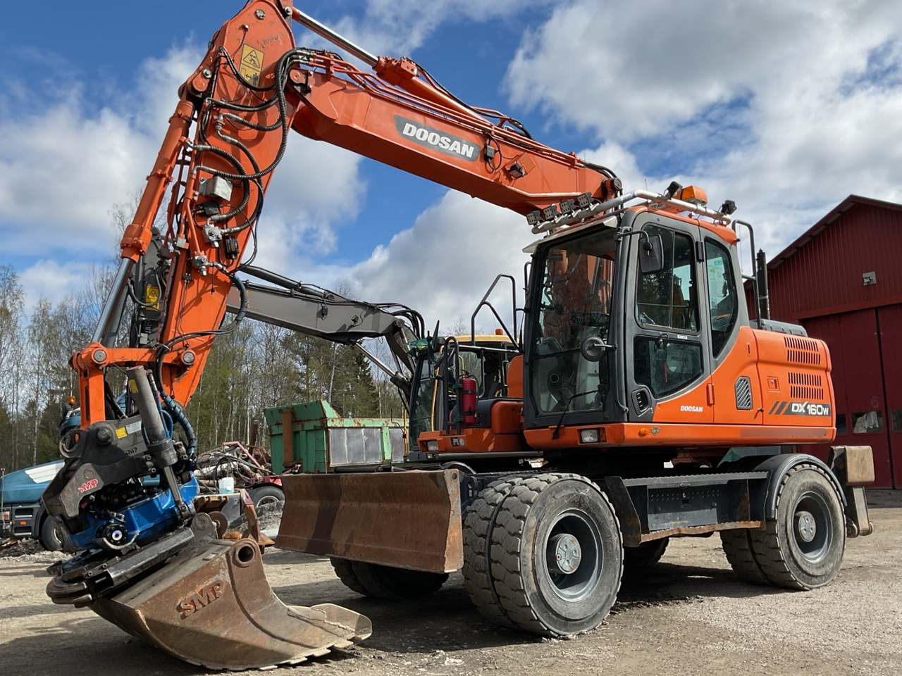 Doosan DX160W - Экскаватор: фото 1 Doosan DX160W - Экскаватор: фото 1