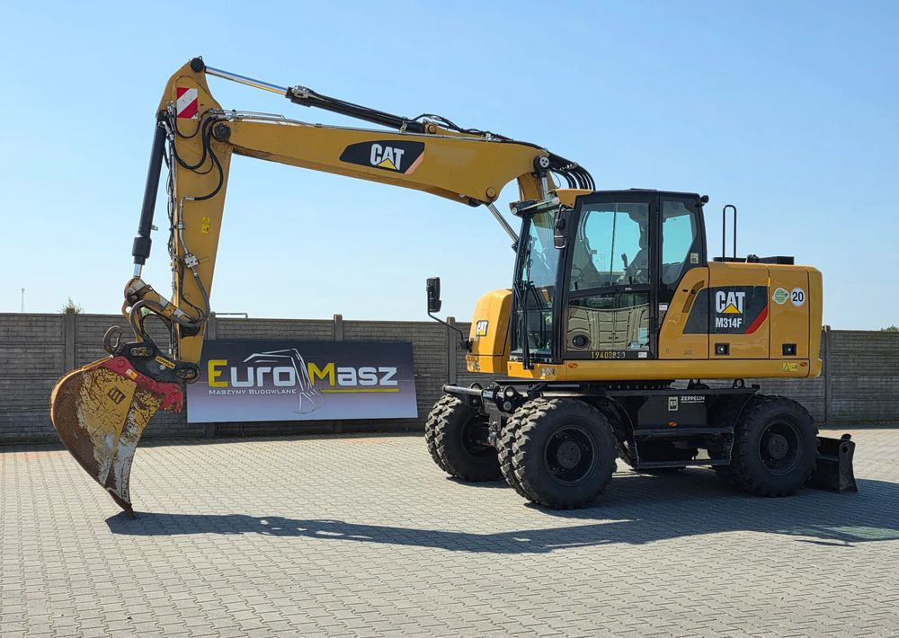 Caterpillar M314F, 2019 ROK, 3300 MTH, OIL QUICK OQ 65 - Колёсный экскаватор: фото 1 Caterpillar M314F, 2019 ROK, 3300 MTH, OIL QUICK OQ 65 - Колёсный экскаватор: фото 1