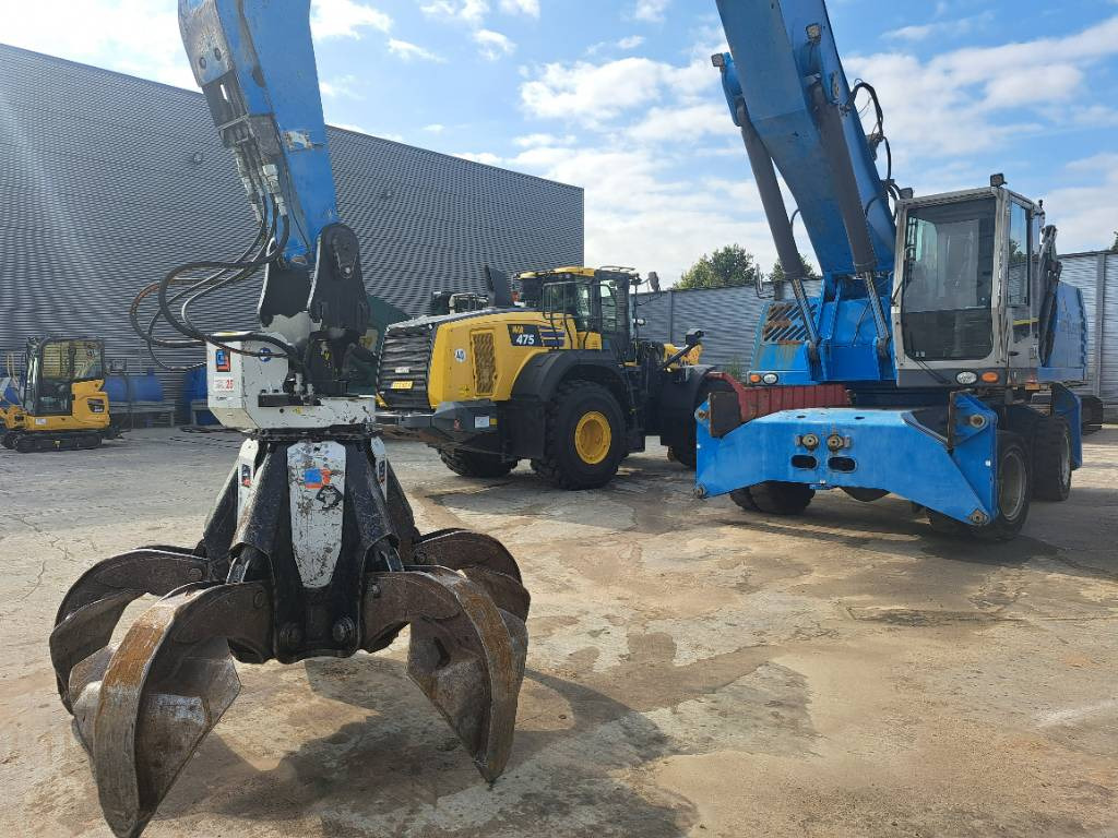 Fuchs MHL360D with low hour engine + grapple - Перегружатель: фото 1 Fuchs MHL360D with low hour engine + grapple - Перегружатель: фото 1