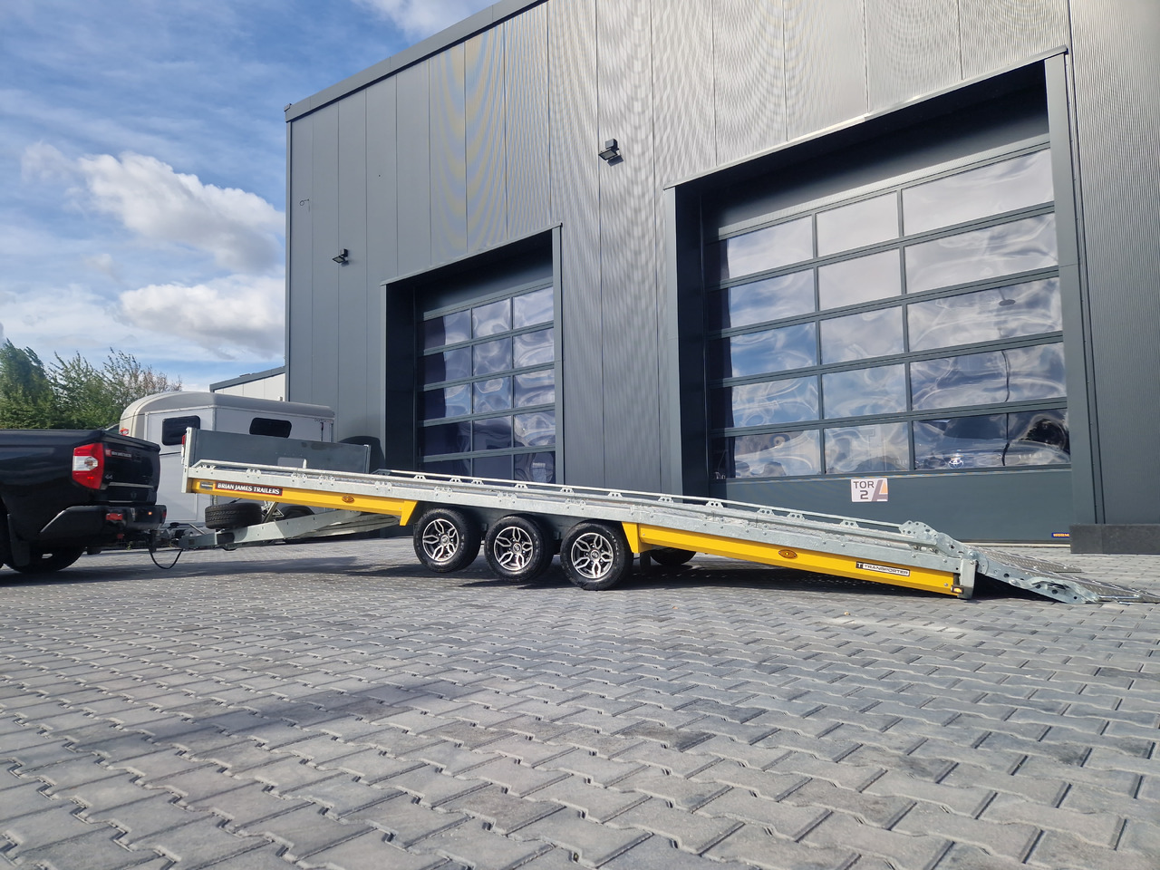 Прицеп-автовоз BJT T Transporter 231 550x224cm yellow ankippbar Heckrampe Tridem Alufelgen 10" 3500kg: фото 11