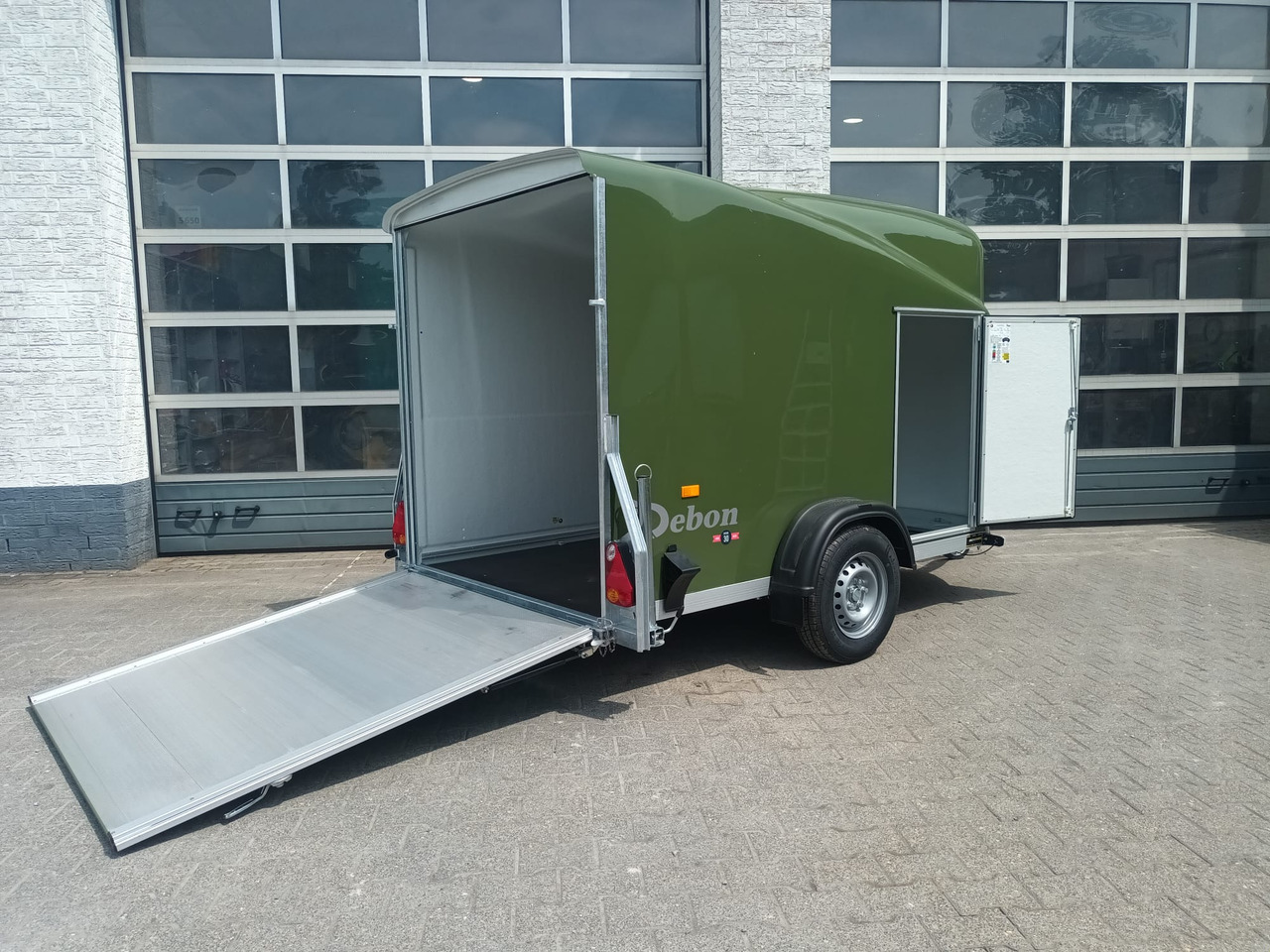 Debon Cargo 1300 300x152x168cm natur green Seitentür Pullman 1300kg 100km/H Juli Aktion 2025 - Прицеп для легкового автомобиля: фото 1 Debon Cargo 1300 300x152x168cm natur green Seitentür Pullman 1300kg 100km/H Juli Aktion 2025 - Прицеп для легкового автомобиля: фото 1