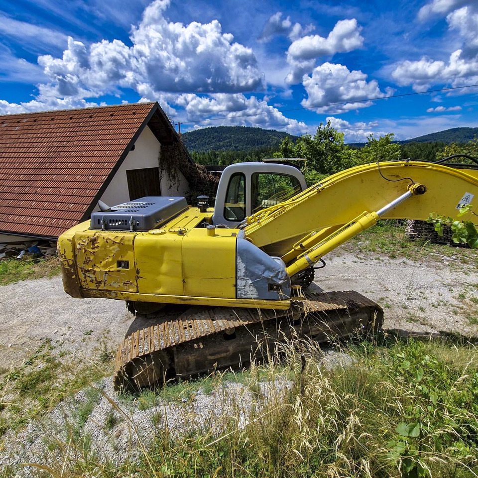 New Holland Kobelco E215 - Гусеничный экскаватор: фото 4 New Holland Kobelco E215 - Гусеничный экскаватор: фото 4