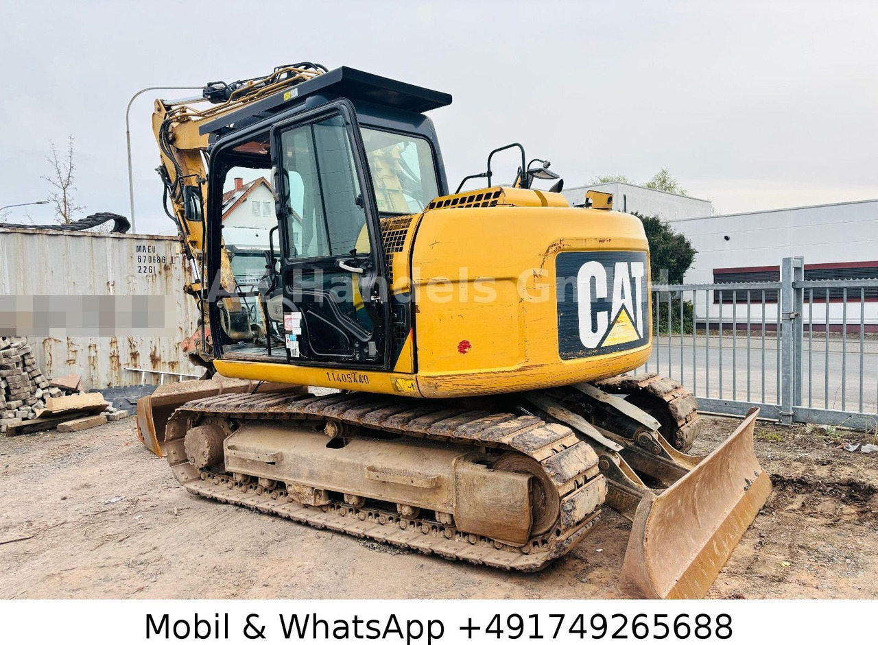 CAT 311D *6600Std./Schnellwechsler/Schaufel/Klima - Гусеничный экскаватор: фото 5 CAT 311D *6600Std./Schnellwechsler/Schaufel/Klima - Гусеничный экскаватор: фото 5