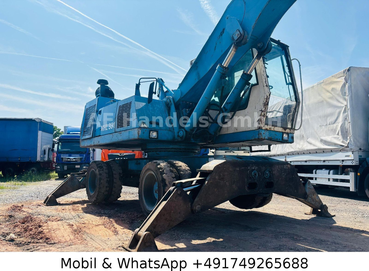 Колёсный экскаватор Terex MHL 331 Umschlagbagger: фото 13 Колёсный экскаватор Terex MHL 331 Umschlagbagger: фото 13