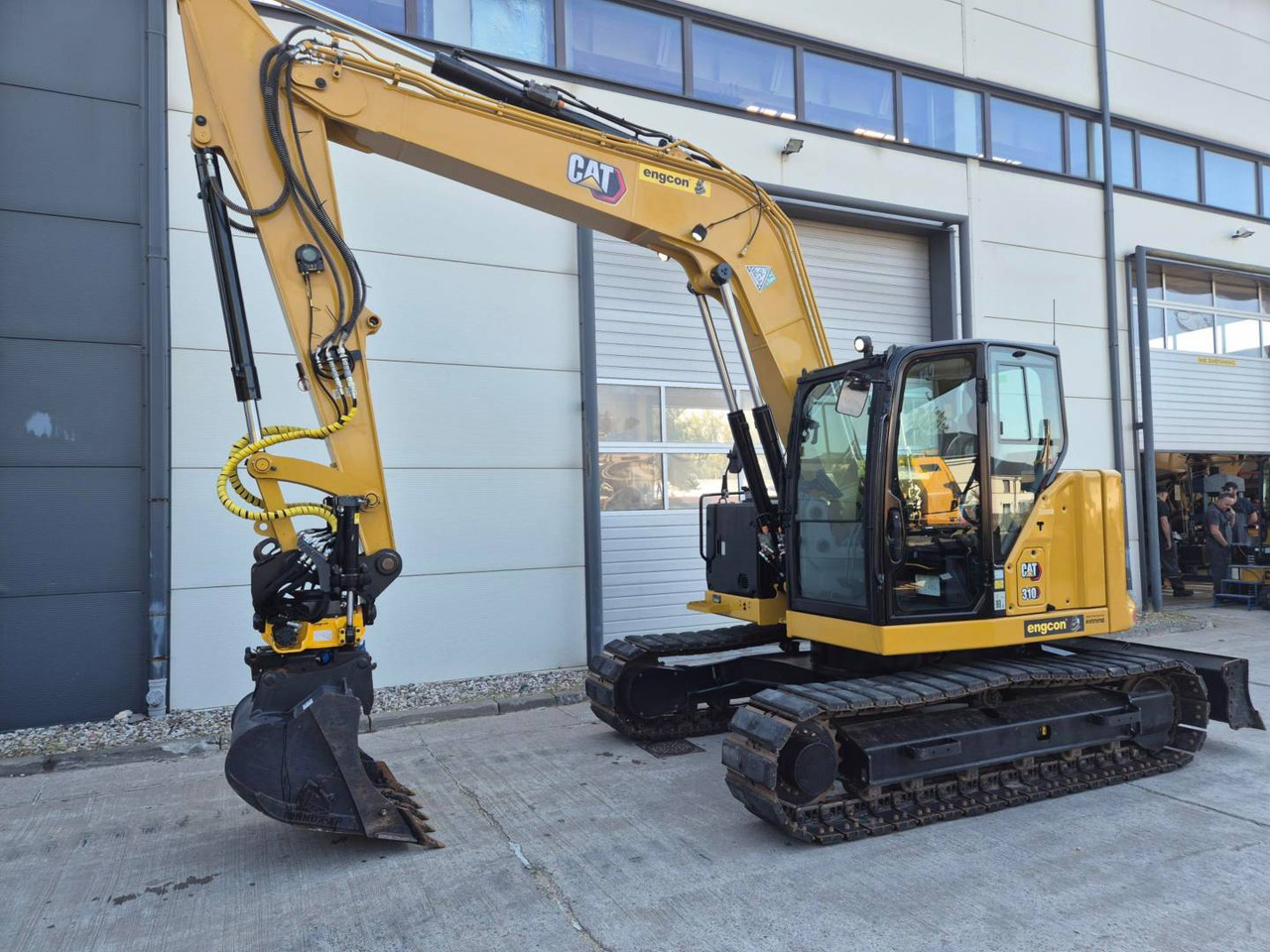 CAT 310 - Гусеничный экскаватор: фото 1 CAT 310 - Гусеничный экскаватор: фото 1