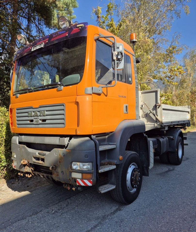 MAN 18.313 FAK 4x4, E3, ohne Kran - Самосвал: фото 1 MAN 18.313 FAK 4x4, E3, ohne Kran - Самосвал: фото 1