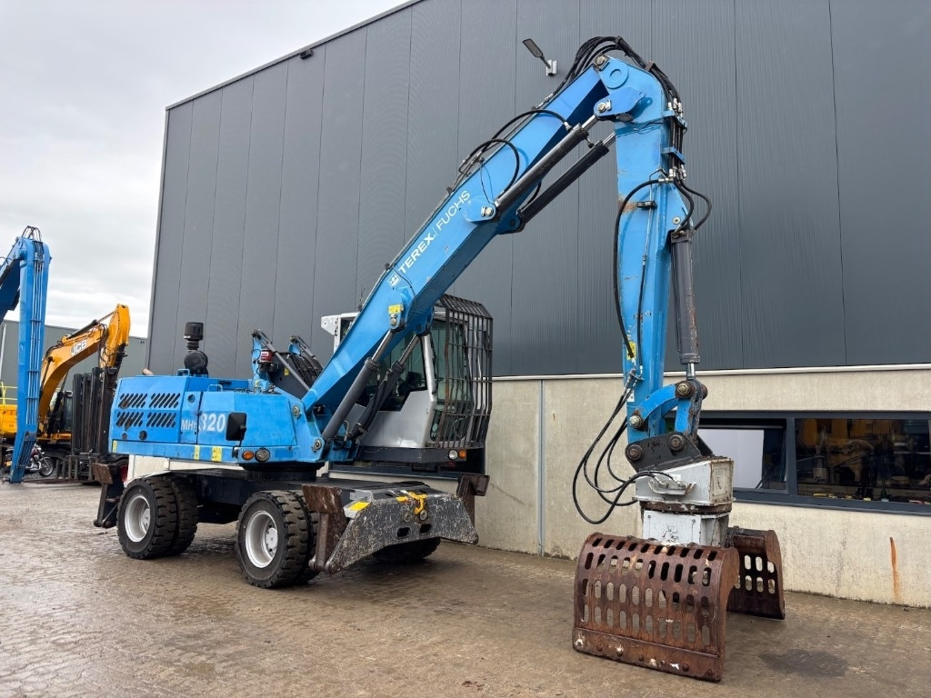 Перегружатель Fuchs MHL 320 D: фото 8