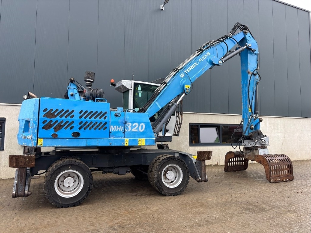 Перегружатель Fuchs MHL 320 D: фото 7