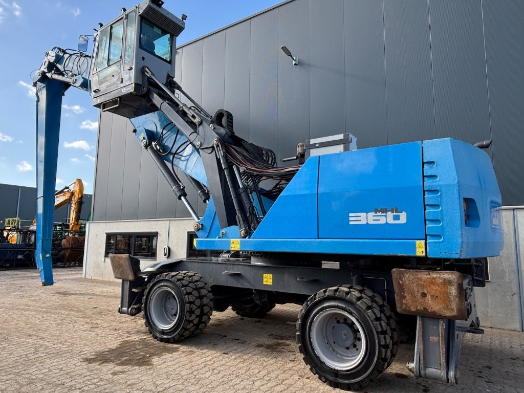 Fuchs MHL 360 - MHL360 - Перегружатель: фото 1 Fuchs MHL 360 - MHL360 - Перегружатель: фото 1