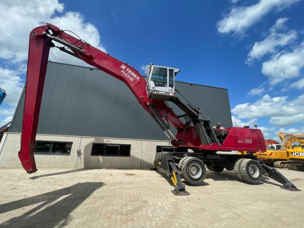 Fuchs MHL380 -- MHL 380 -- 21 mtr reach - Перегружатель: фото 1 Fuchs MHL380 -- MHL 380 -- 21 mtr reach - Перегружатель: фото 1