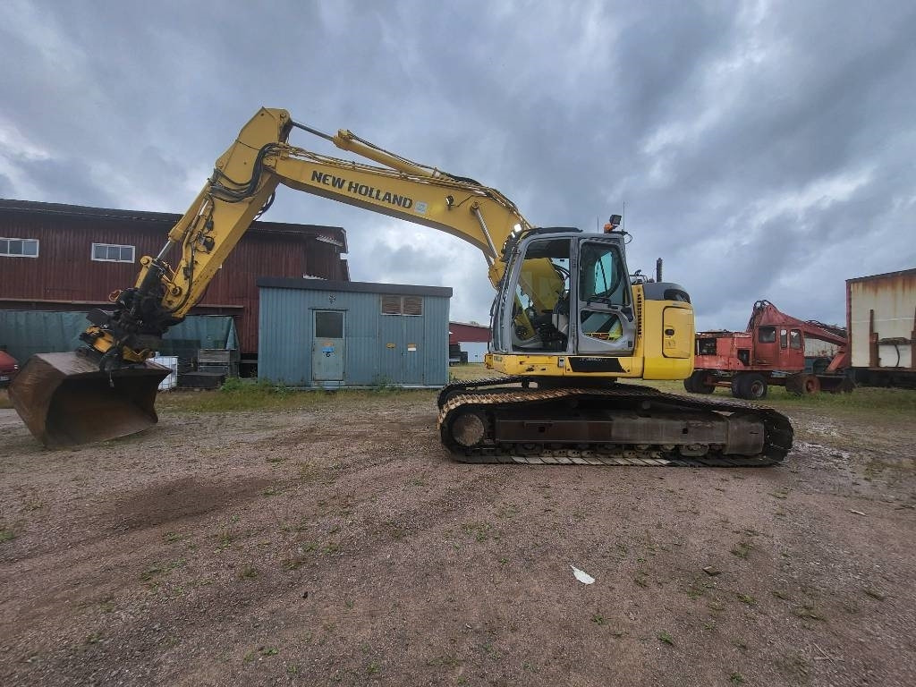 New Holland Kobelco E 235 B SR-2 - Гусеничный экскаватор: фото 2 New Holland Kobelco E 235 B SR-2 - Гусеничный экскаватор: фото 2