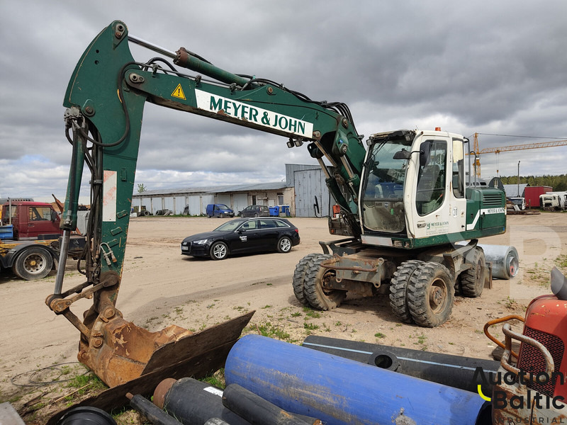 Liebherr A 900 C Litronic - Колёсный экскаватор: фото 1 Liebherr A 900 C Litronic - Колёсный экскаватор: фото 1