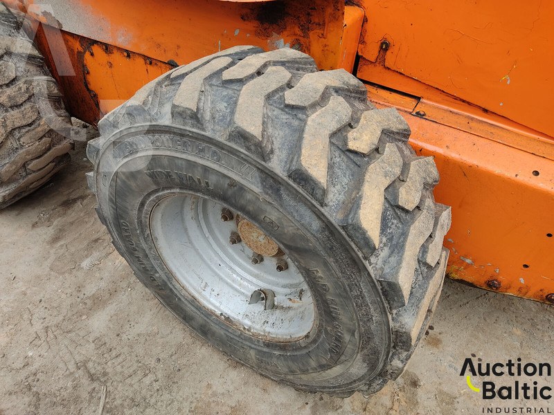 Мини-погрузчик с бортовым поворотом New Holland LS 185 B: фото 18