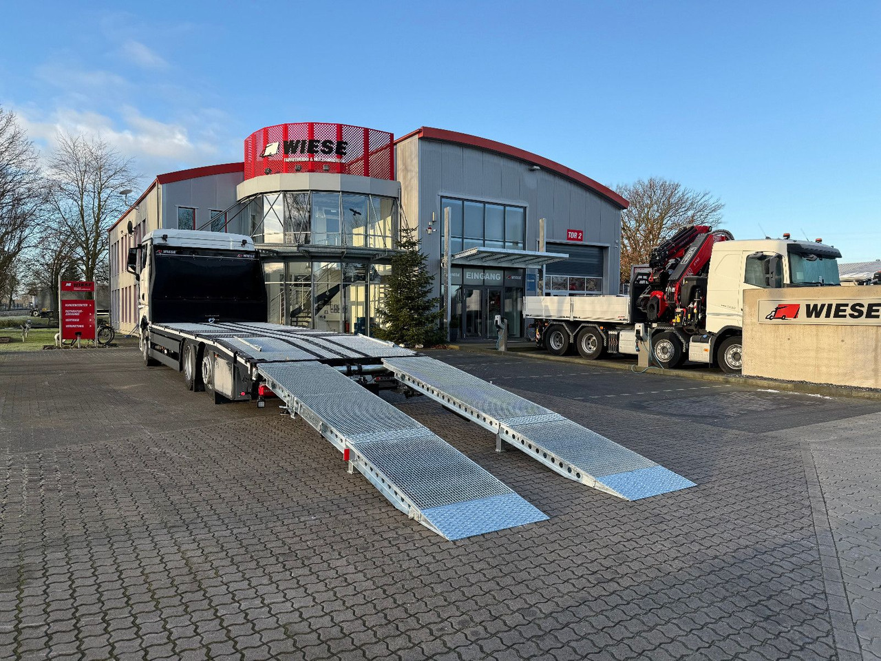 MAN Baumaschinen-  Arbeitsbühnentransporter Rampen - Автовоз: фото 1 MAN Baumaschinen-  Arbeitsbühnentransporter Rampen - Автовоз: фото 1