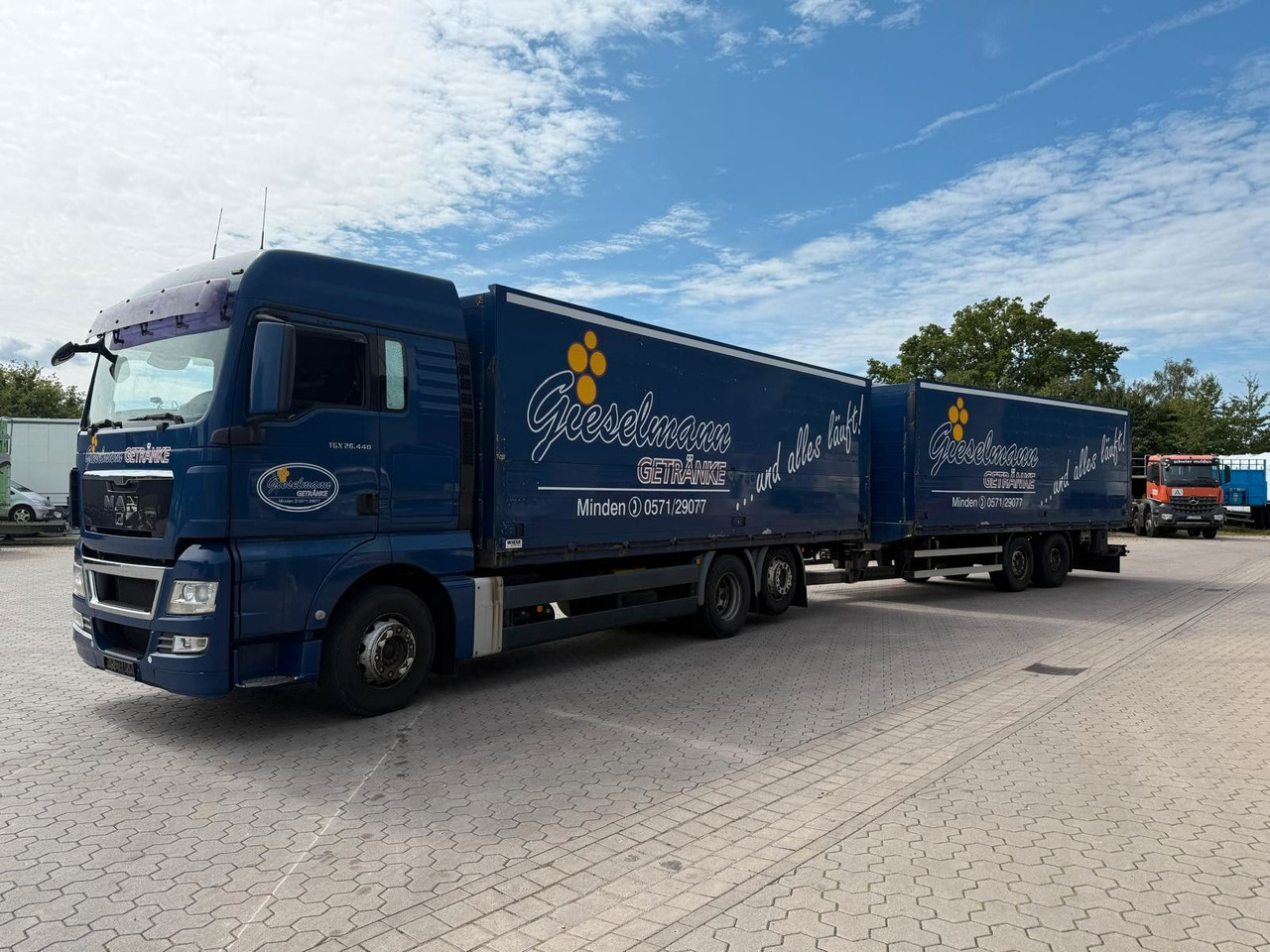 MAN TGA Schwenkwand-Getränkeaufbau incl. Anhänger - Грузовик для перевозки напитков: фото 2 MAN TGA Schwenkwand-Getränkeaufbau incl. Anhänger - Грузовик для перевозки напитков: фото 2