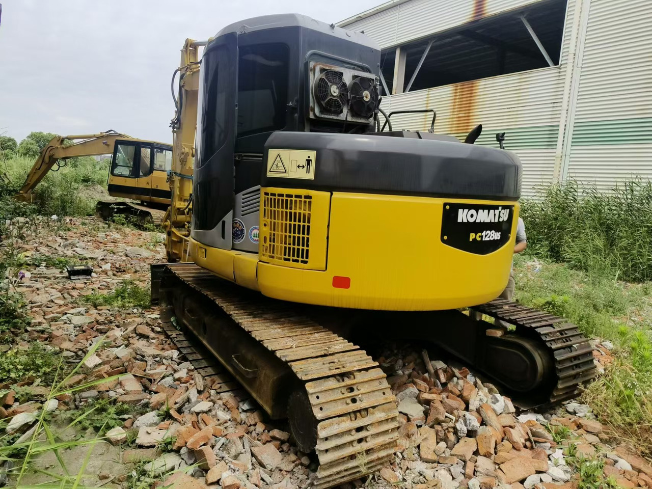 KOMATSU PC128US - Экскаватор: фото 2 KOMATSU PC128US - Экскаватор: фото 2