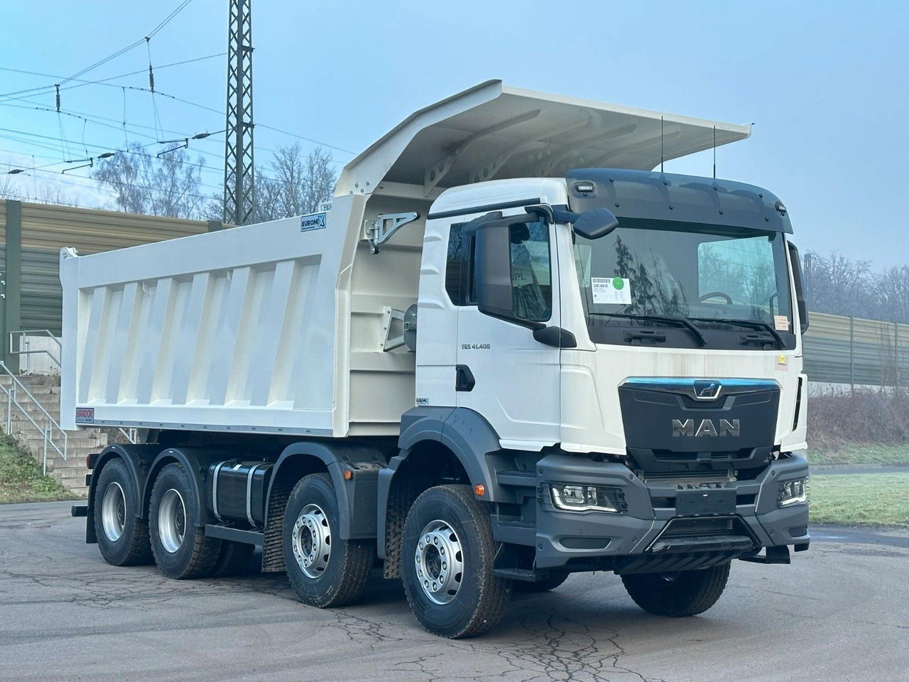 MAN TGS 41.400 8x4 / EUROMIX MTP 23m³/ Eckige Mulde MAN TGS 41.400 8x4 / EUROMIX MTP 23m³/ Eckige Mulde - Самосвал: фото 4 MAN TGS 41.400 8x4 / EUROMIX MTP 23m³/ Eckige Mulde MAN TGS 41.400 8x4 / EUROMIX MTP 23m³/ Eckige Mulde - Самосвал: фото 4