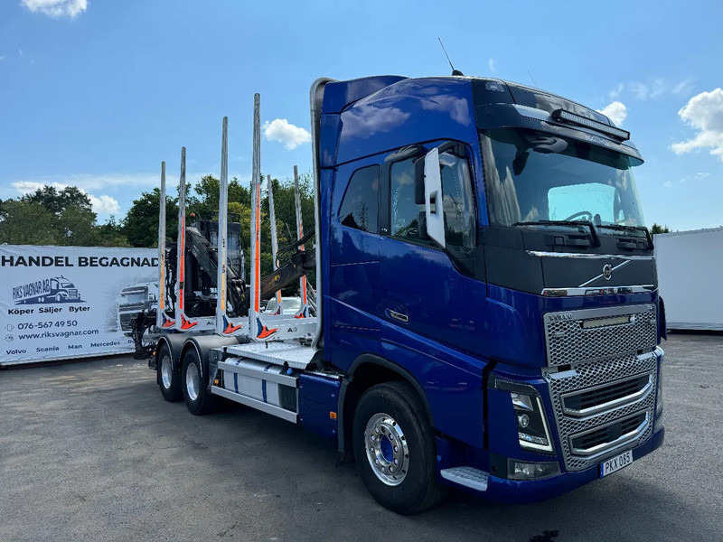 Volvo FH 6x4, Timber-truck + Jonsered 1080, 2017 - Лесовоз, Автоманипулятор: фото 1 Volvo FH 6x4, Timber-truck + Jonsered 1080, 2017 - Лесовоз, Автоманипулятор: фото 1