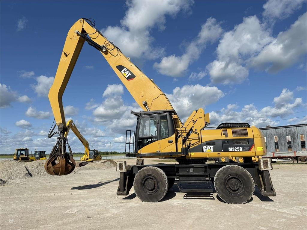 CAT M 325 DLMH - Колёсный экскаватор: фото 4 CAT M 325 DLMH - Колёсный экскаватор: фото 4