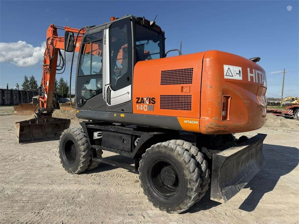 Hitachi ZX 140 W - Колёсный экскаватор: фото 1 Hitachi ZX 140 W - Колёсный экскаватор: фото 1