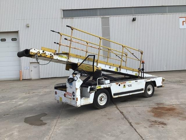 Tug T660-1 - Ленточный погрузчик багажа: фото 1 Tug T660-1 - Ленточный погрузчик багажа: фото 1