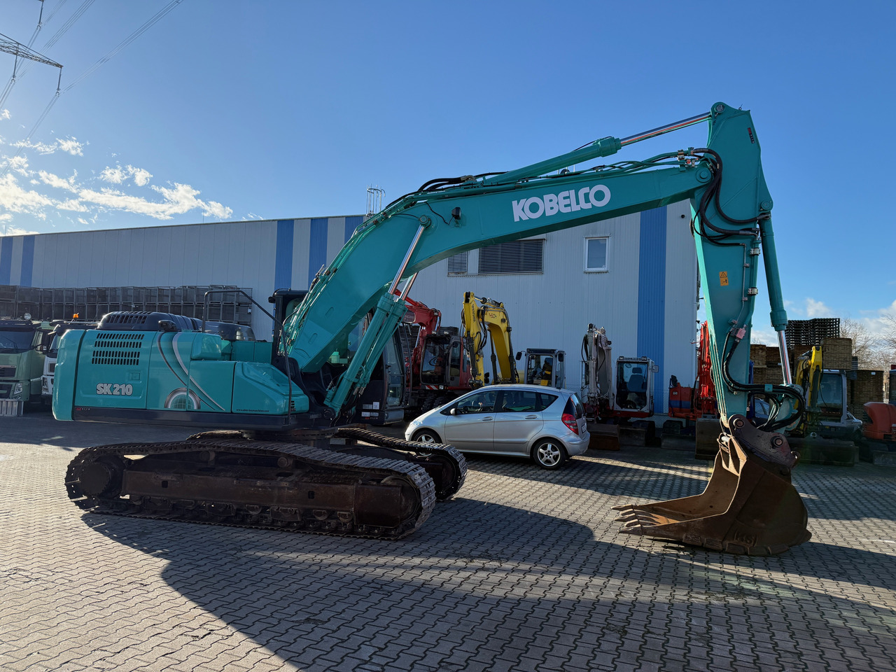 Kobelco SK210 NLC-10 Kettenbagger Oilquick Klima - Гусеничный экскаватор: фото 3 Kobelco SK210 NLC-10 Kettenbagger Oilquick Klima - Гусеничный экскаватор: фото 3