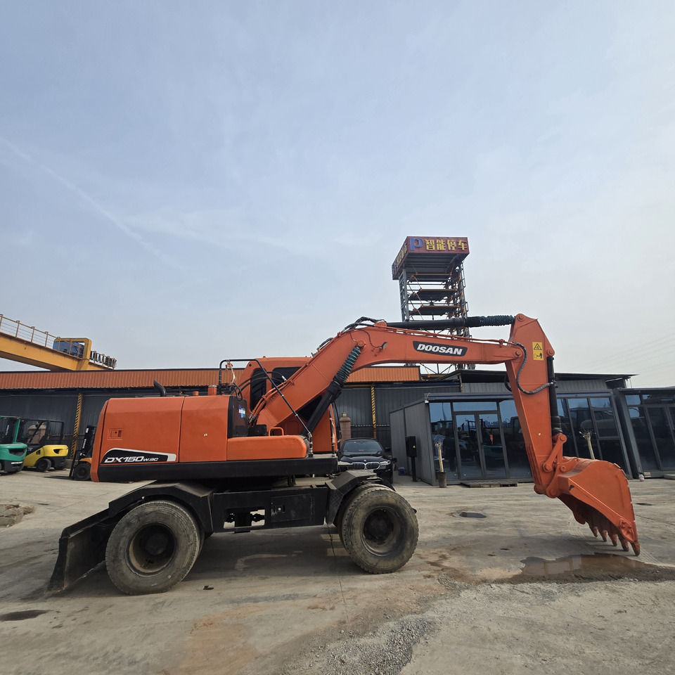 DOOSAN DX150W - Колёсный экскаватор: фото 4 DOOSAN DX150W - Колёсный экскаватор: фото 4