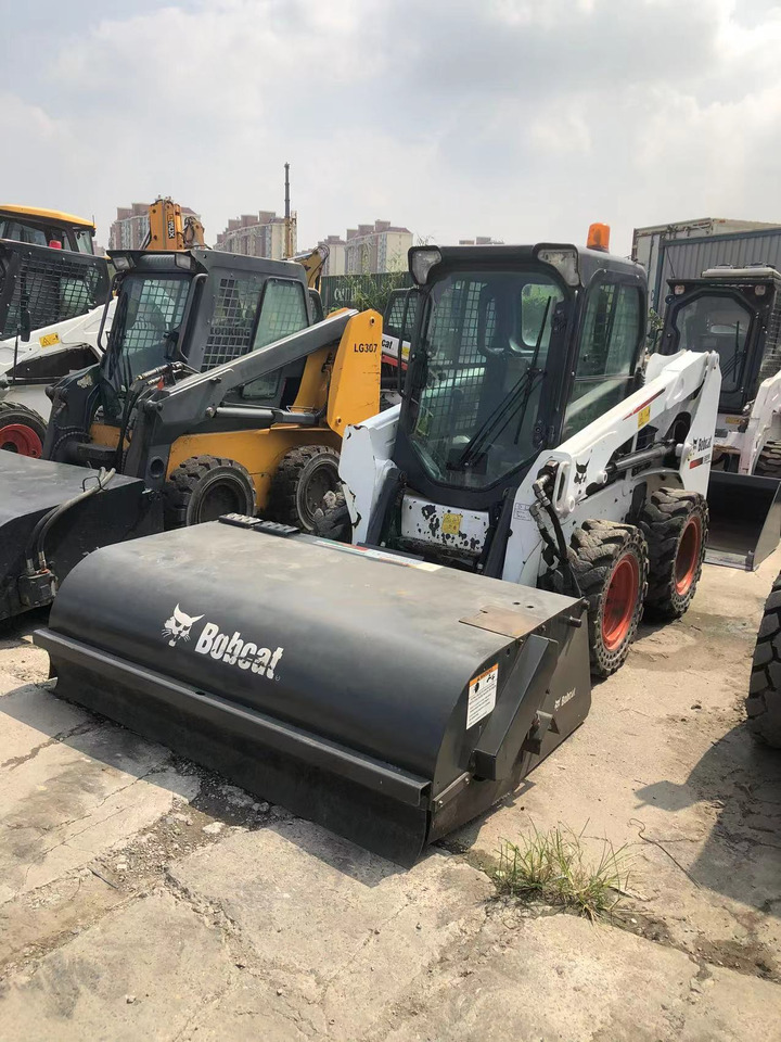 BOBCAT S550 - Мини-погрузчик с бортовым поворотом: фото 2 BOBCAT S550 - Мини-погрузчик с бортовым поворотом: фото 2