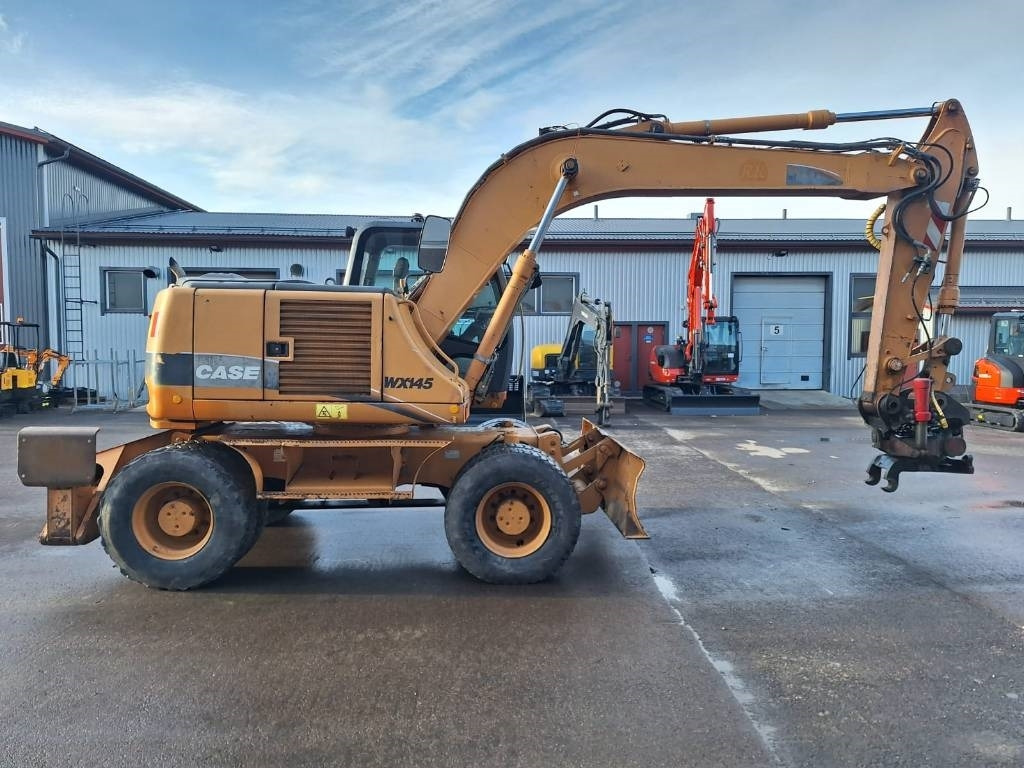 Case WX145 PYÖRITTÄJÄLLÄ  - Колёсный экскаватор: фото 5 Case WX145 PYÖRITTÄJÄLLÄ  - Колёсный экскаватор: фото 5