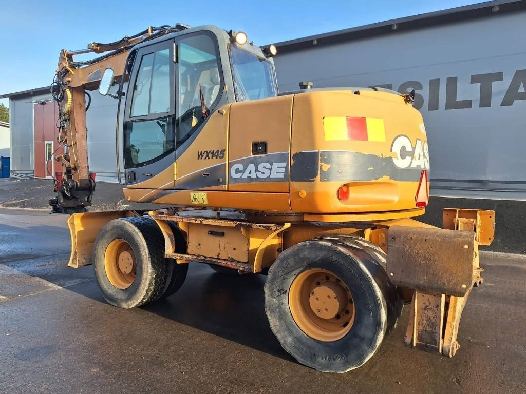 Case WX145 PYÖRITTÄJÄLLÄ  - Колёсный экскаватор: фото 2 Case WX145 PYÖRITTÄJÄLLÄ  - Колёсный экскаватор: фото 2