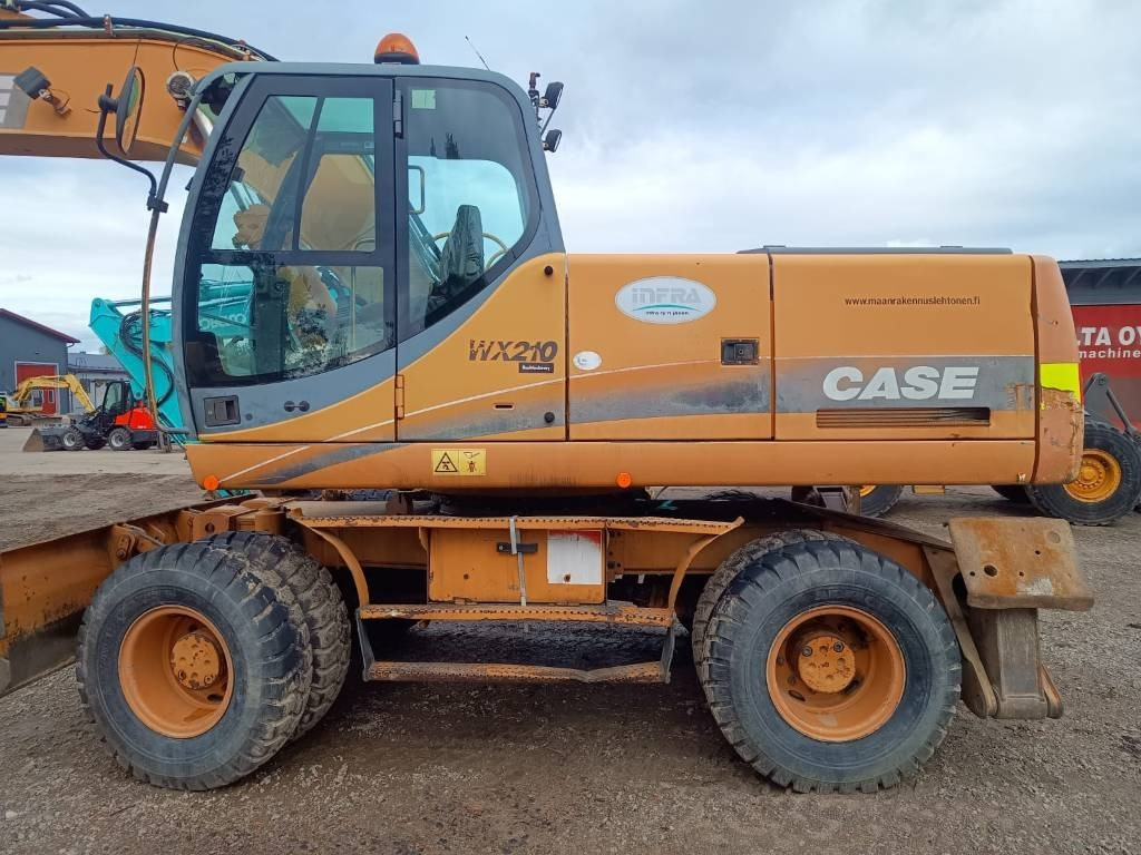 Case WX210 PYÖRITTÄJÄLLÄ  - Колёсный экскаватор: фото 2 Case WX210 PYÖRITTÄJÄLLÄ  - Колёсный экскаватор: фото 2