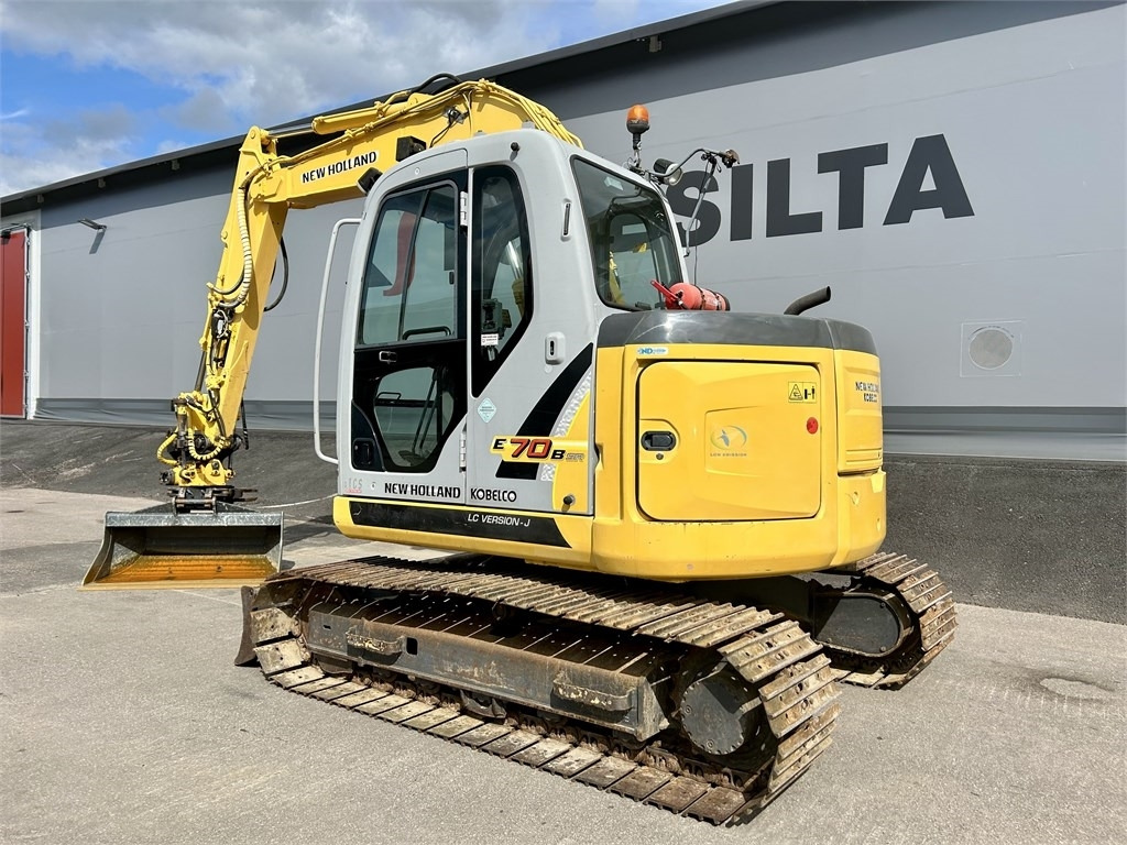New Holland E 70BSR 2D MITTALAITTEET - Мини-экскаватор: фото 2 New Holland E 70BSR 2D MITTALAITTEET - Мини-экскаватор: фото 2