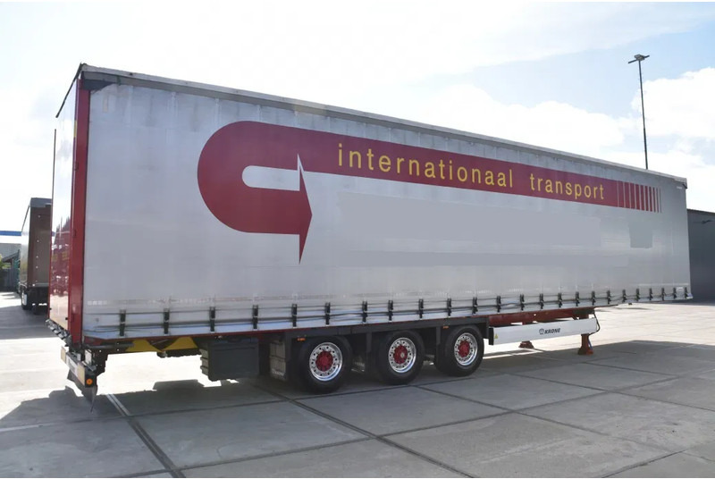 Krone SD - MEGA - SLIDING CURTAINS/ROOF - LIFTING ROOF - BPW AXLES - DISC BRAKES - ALCOA DURA BRIGHT - EXCELLENT CONDITION - - Полуприцеп-фургон: фото 4 Krone SD - MEGA - SLIDING CURTAINS/ROOF - LIFTING ROOF - BPW AXLES - DISC BRAKES - ALCOA DURA BRIGHT - EXCELLENT CONDITION - - Полуприцеп-фургон: фото 4