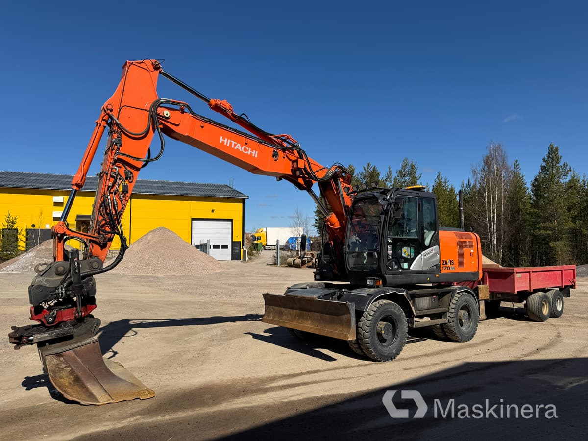 Hitachi ZX170W-5B Hjulgrävare Hitachi ZX170W med vagn - Гусеничный экскаватор: фото 1 Hitachi ZX170W-5B Hjulgrävare Hitachi ZX170W med vagn - Гусеничный экскаватор: фото 1