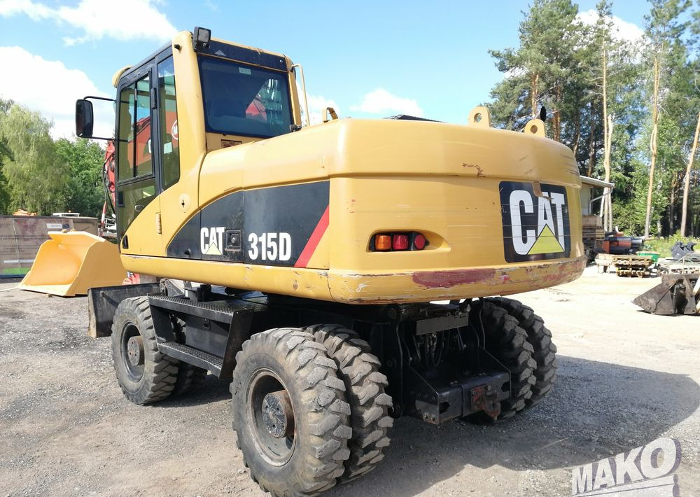 Caterpillar M315 C - Колёсный экскаватор: фото 3 Caterpillar M315 C - Колёсный экскаватор: фото 3