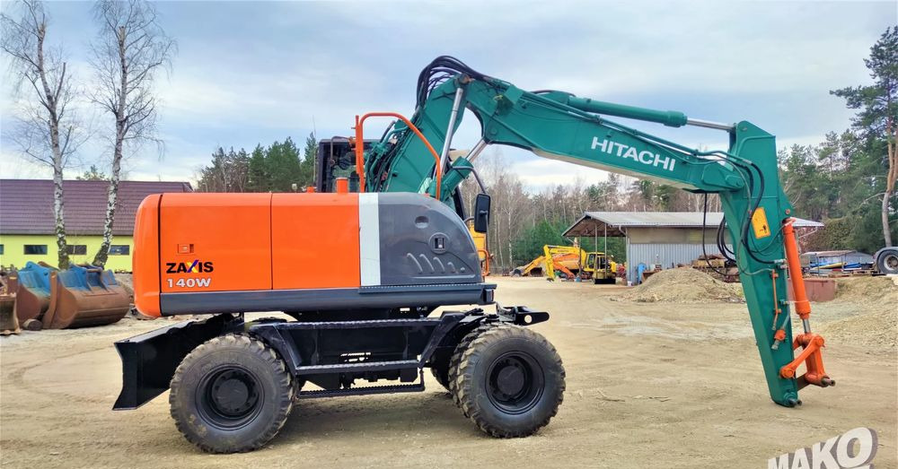 Hitachi ZX140W-3 - Колёсный экскаватор: фото 5 Hitachi ZX140W-3 - Колёсный экскаватор: фото 5