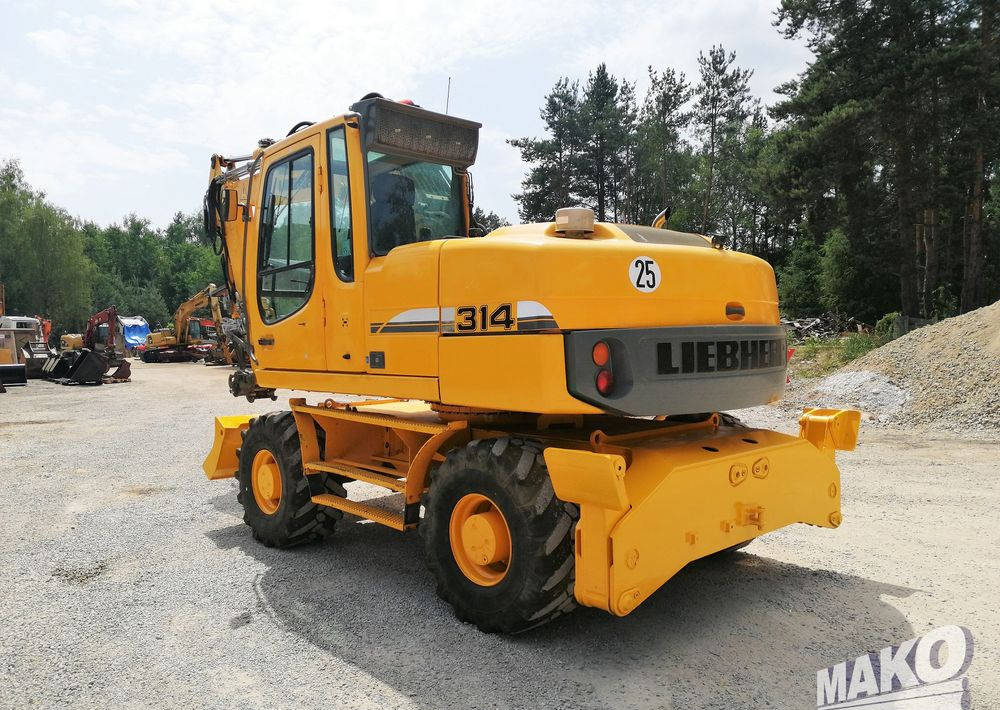 Liebherr A 314 Litronic - Колёсный экскаватор: фото 3 Liebherr A 314 Litronic - Колёсный экскаватор: фото 3